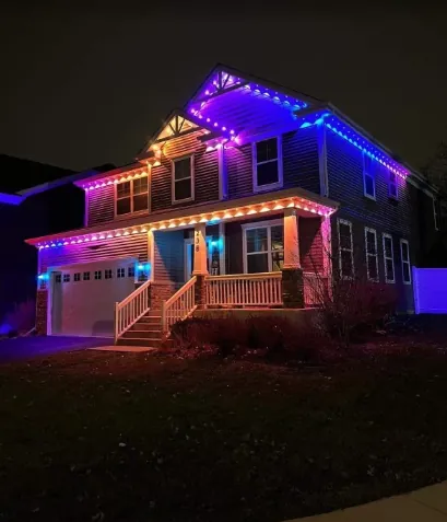 Permanent roofline lighting set to purple, blue, and orange